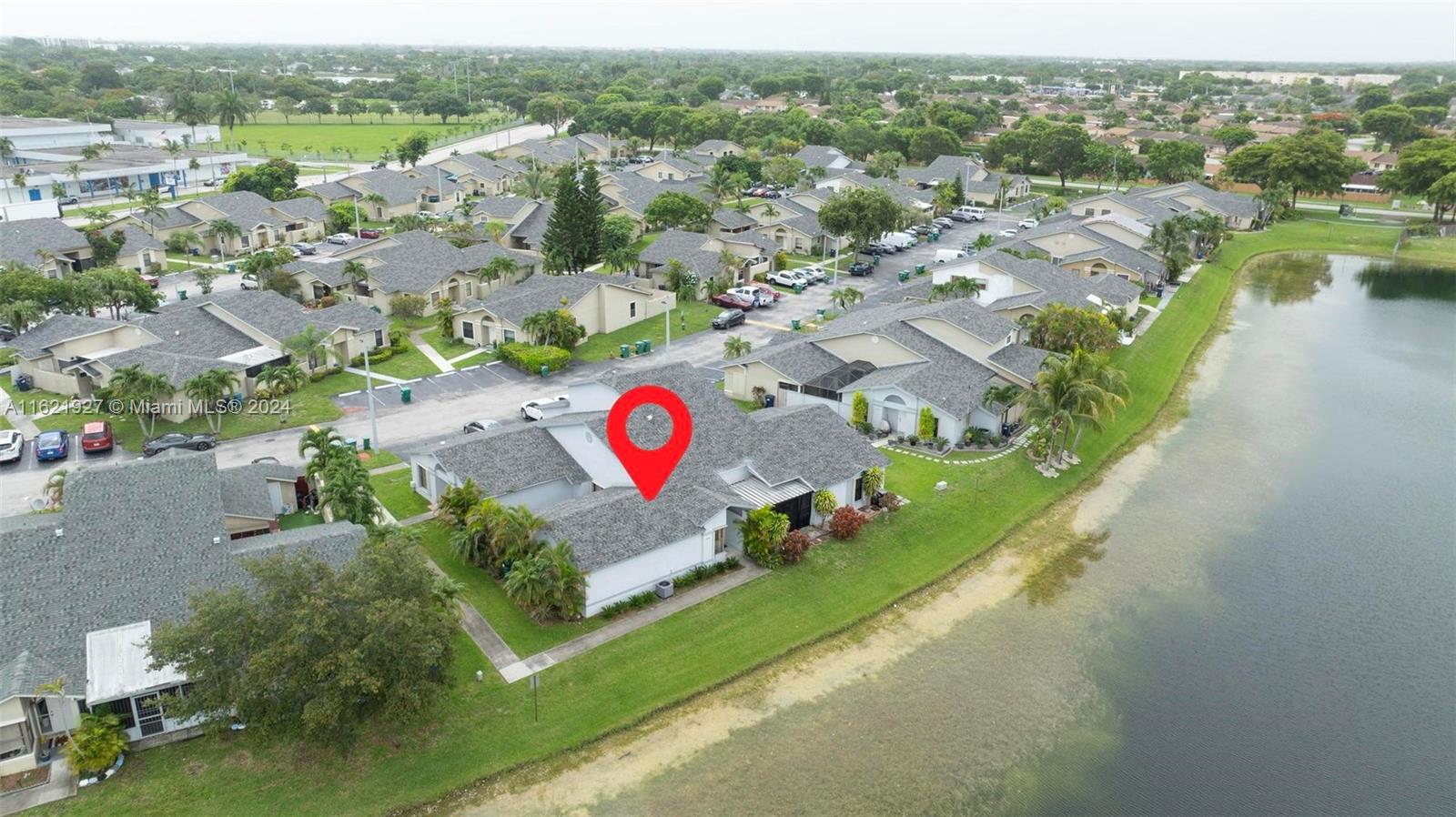 6604 Southwest 152nd Place, Unit 2604 Miami, FL 33193 - Photo 23 of 27 an aerial view of a golf course with outdoor space