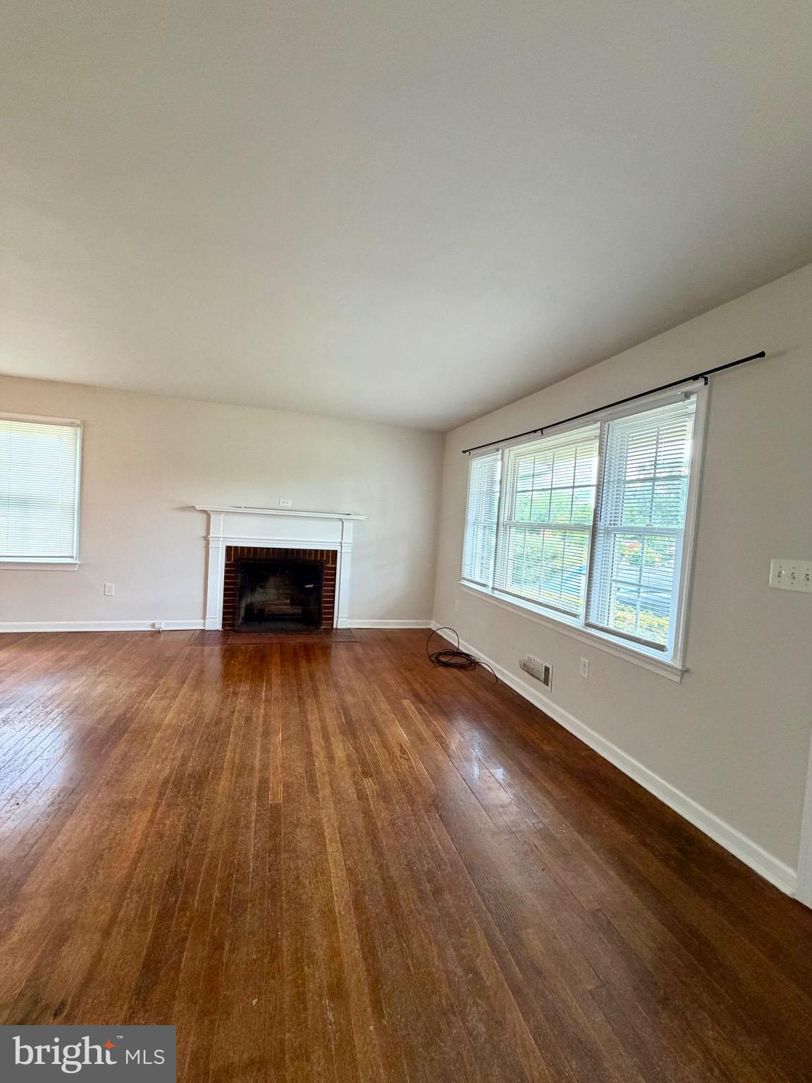 1010 Nottingham Street Culpeper, VA 22701 - Photo 17 of 21 a view of empty room with wooden floor and fan