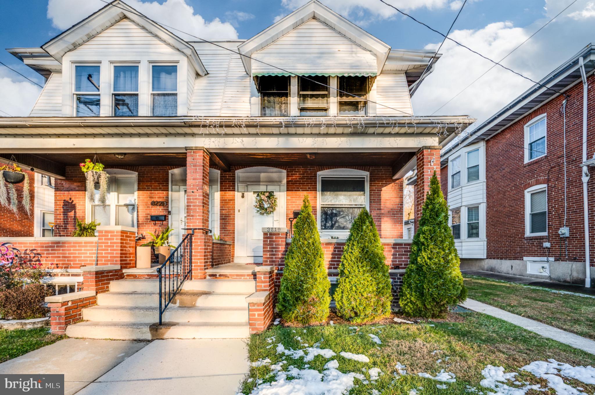 Charming duplex with inviting curb appeal.