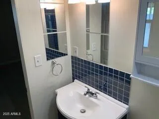 a house view with a backyard space