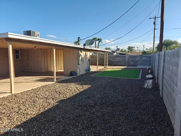 a view of a porch with a yard
