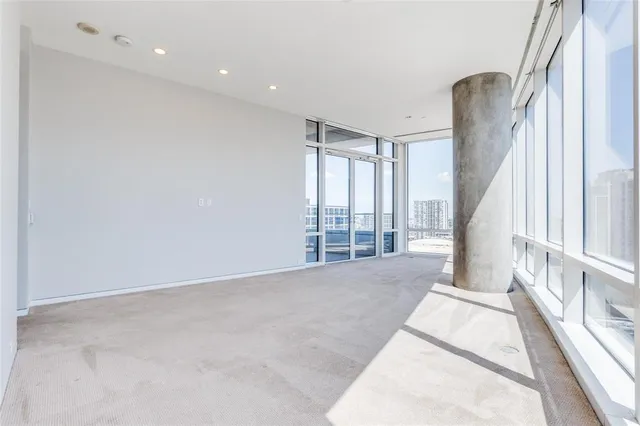 a view of an empty room and window