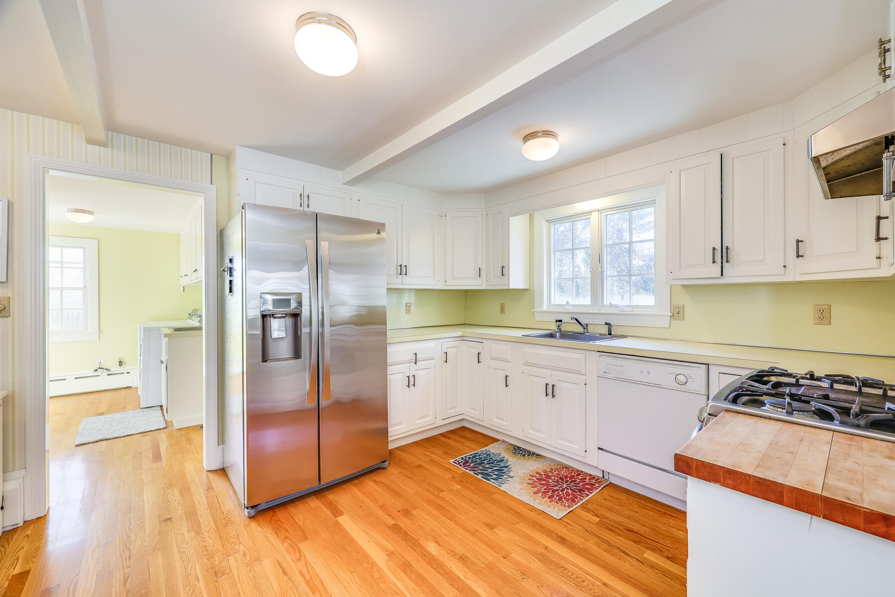 87 First Avenue Hyannis Port, MA 02601 - Photo 11 of 29 a kitchen with stainless steel appliances granite countertop a refrigerator and a stove top oven