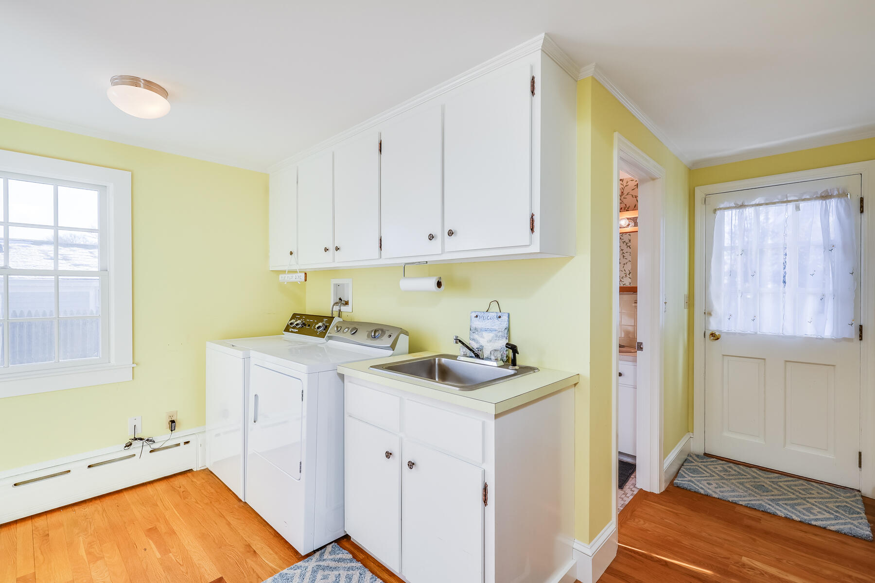 87 First Avenue Hyannis Port, MA 02601 - Photo 12 of 29 a view of a storage & utility room with a window