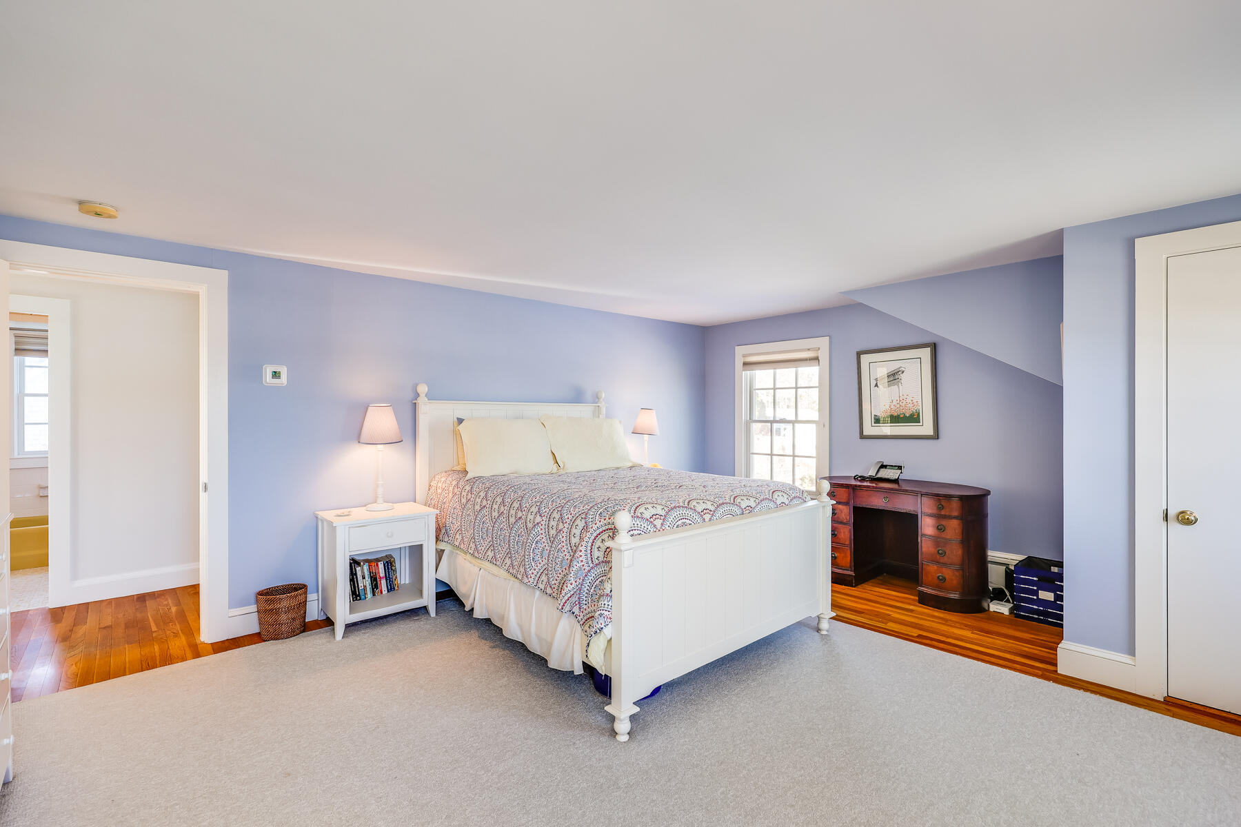 87 First Avenue Hyannis Port, MA 02601 - Photo 16 of 29 a spacious bedroom with a bed and a couch