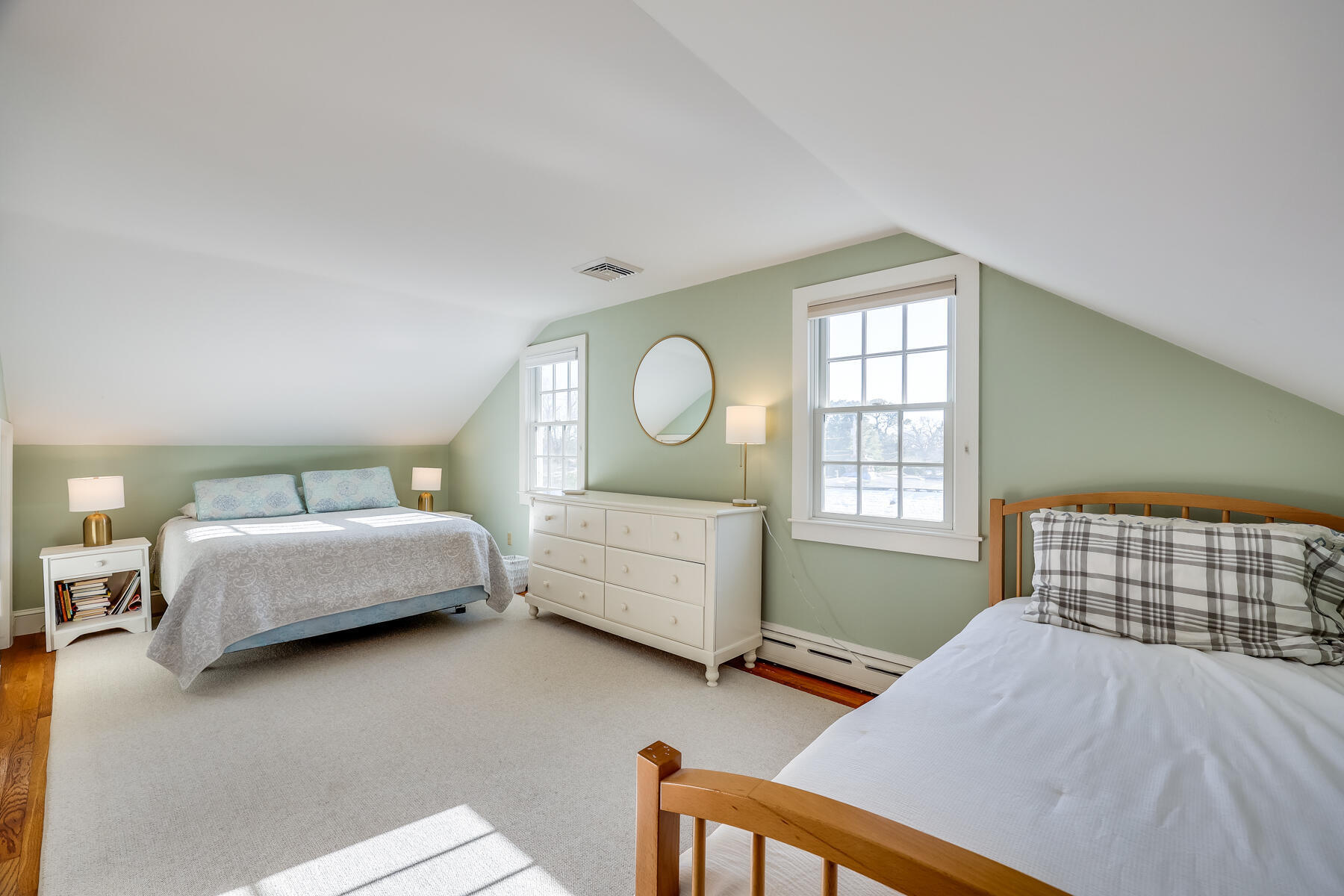 87 First Avenue Hyannis Port, MA 02601 - Photo 19 of 29 a bedroom with a bed and a dresser