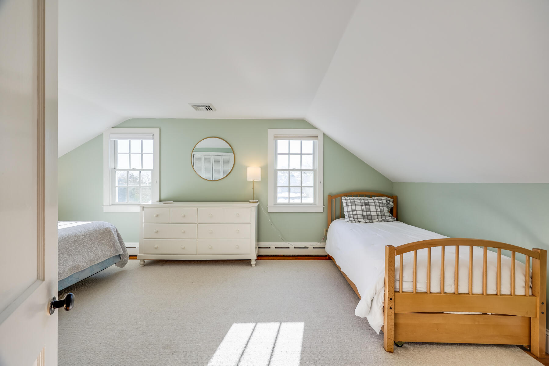 87 First Avenue Hyannis Port, MA 02601 - Photo 20 of 29 a bedroom with a bed mirror and window