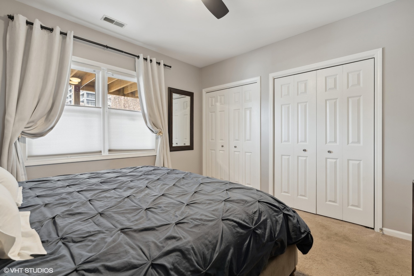 825 South Miller Street, Unit 2 Chicago, IL 60607 - Photo 11 of 15 a bedroom with a bed and a window