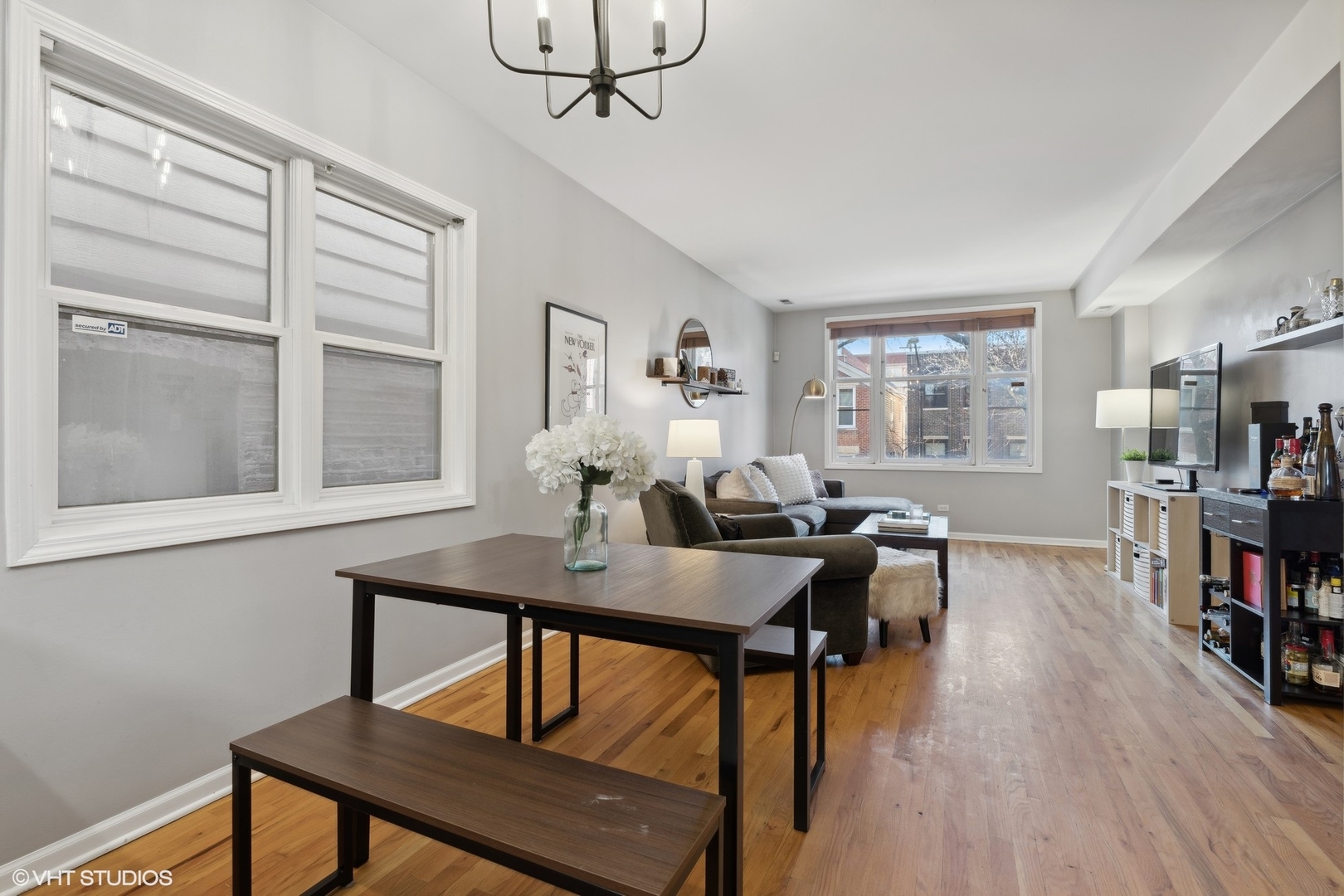 825 South Miller Street, Unit 2 Chicago, IL 60607 - Photo 6 of 15 a view of a dining room with furniture and a window