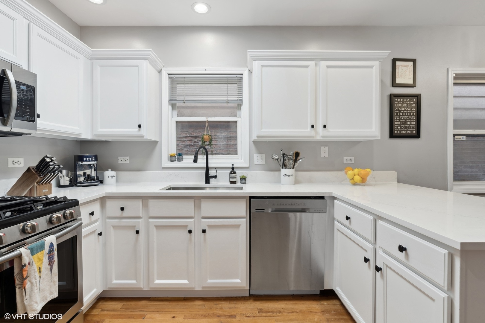 825 South Miller Street, Unit 2 Chicago, IL 60607 - Photo 8 of 15 a kitchen with cabinets appliances and a sink