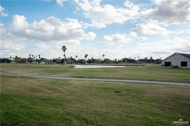 a view of a lake with a big yard