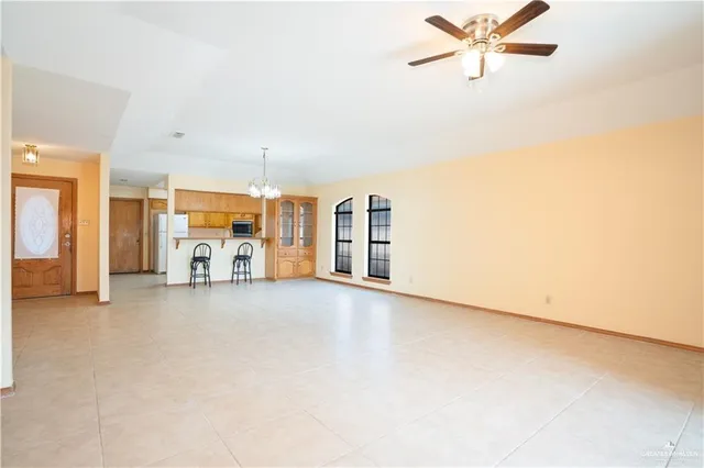 a view of a livingroom with a kitchen