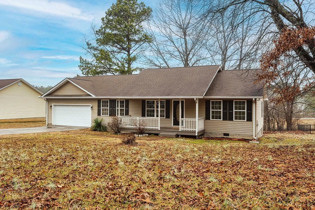109 Fairview Road Athens, TN 37303 - Photo 36 of 36 a house that has a tree in front of it