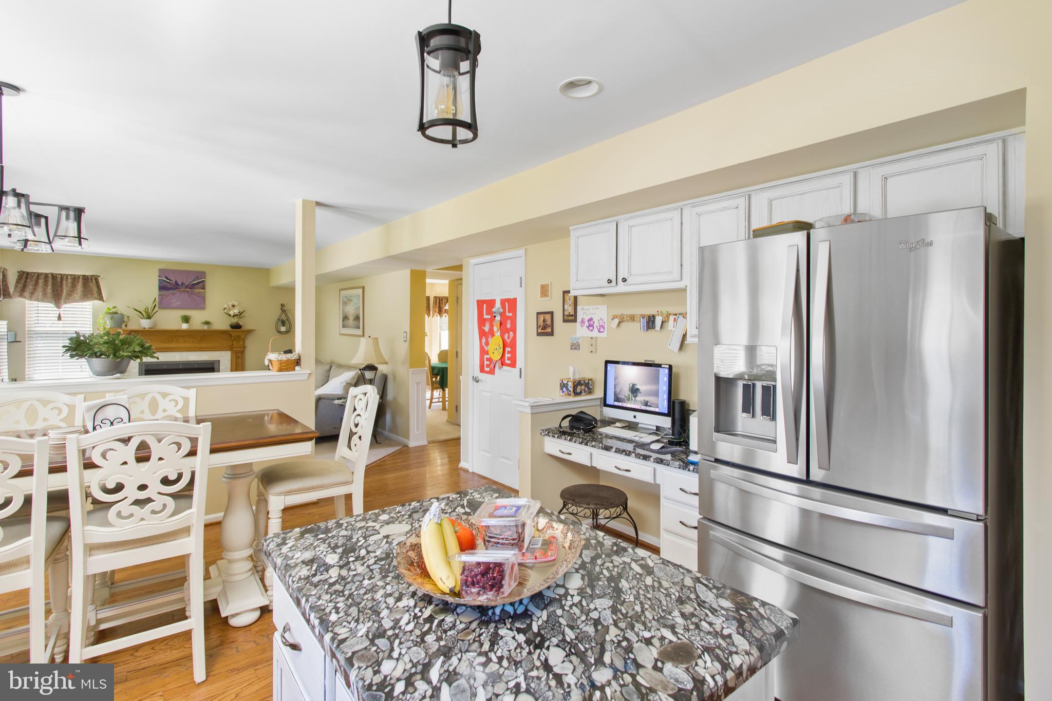 25 Springcress Drive Delran, NJ 08075 - Photo 14 of 44 a kitchen with stainless steel appliances granite countertop a refrigerator and microwave