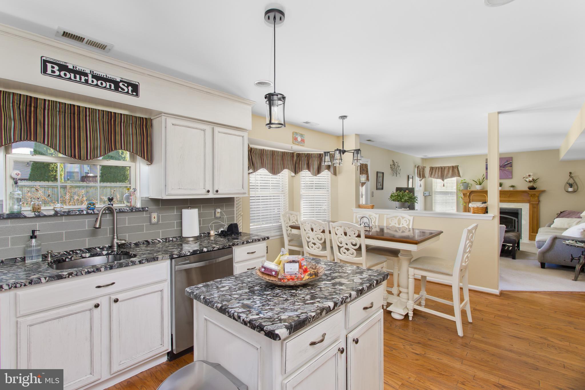 25 Springcress Drive Delran, NJ 08075 - Photo 15 of 44 a kitchen with a counter top space appliances and cabinets