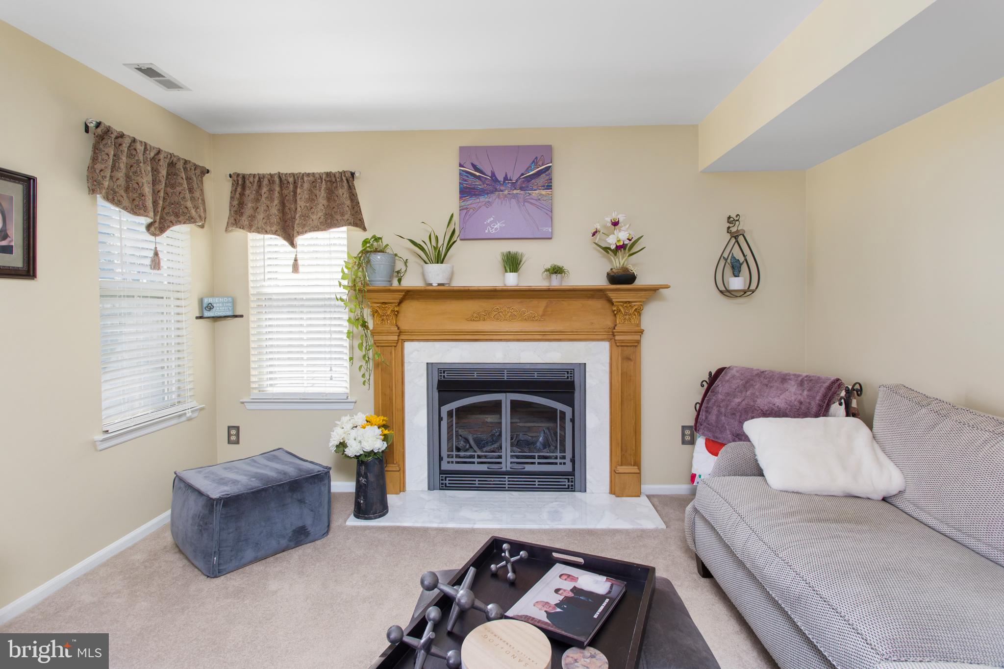 25 Springcress Drive Delran, NJ 08075 - Photo 17 of 44 a living room with furniture and a fireplace
