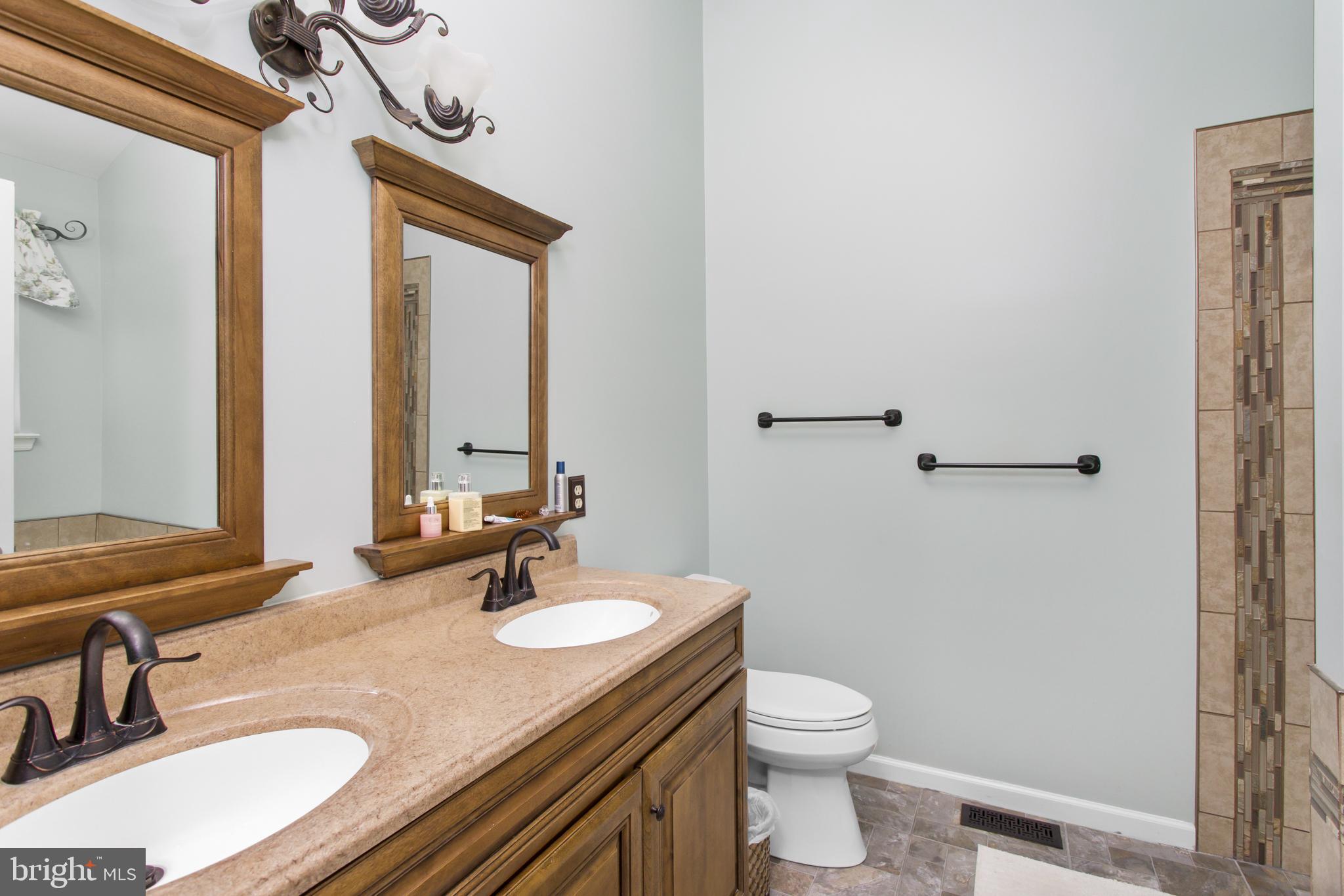 25 Springcress Drive Delran, NJ 08075 - Photo 27 of 44 a bathroom with a granite countertop sink toilet and shower
