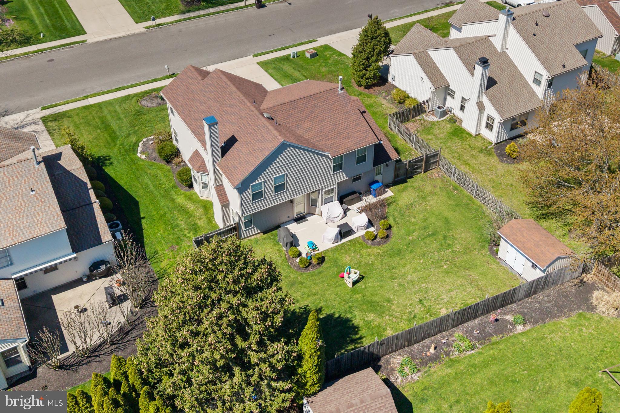 25 Springcress Drive Delran, NJ 08075 - Photo 42 of 44 an aerial view of a house with a garden and swimming pool