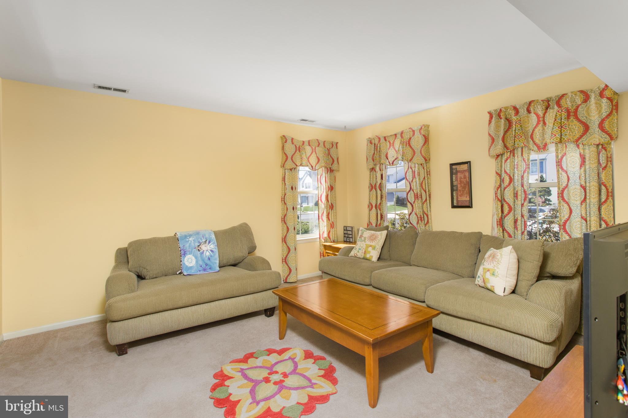 25 Springcress Drive Delran, NJ 08075 - Photo 7 of 44 a living room with furniture and a couch