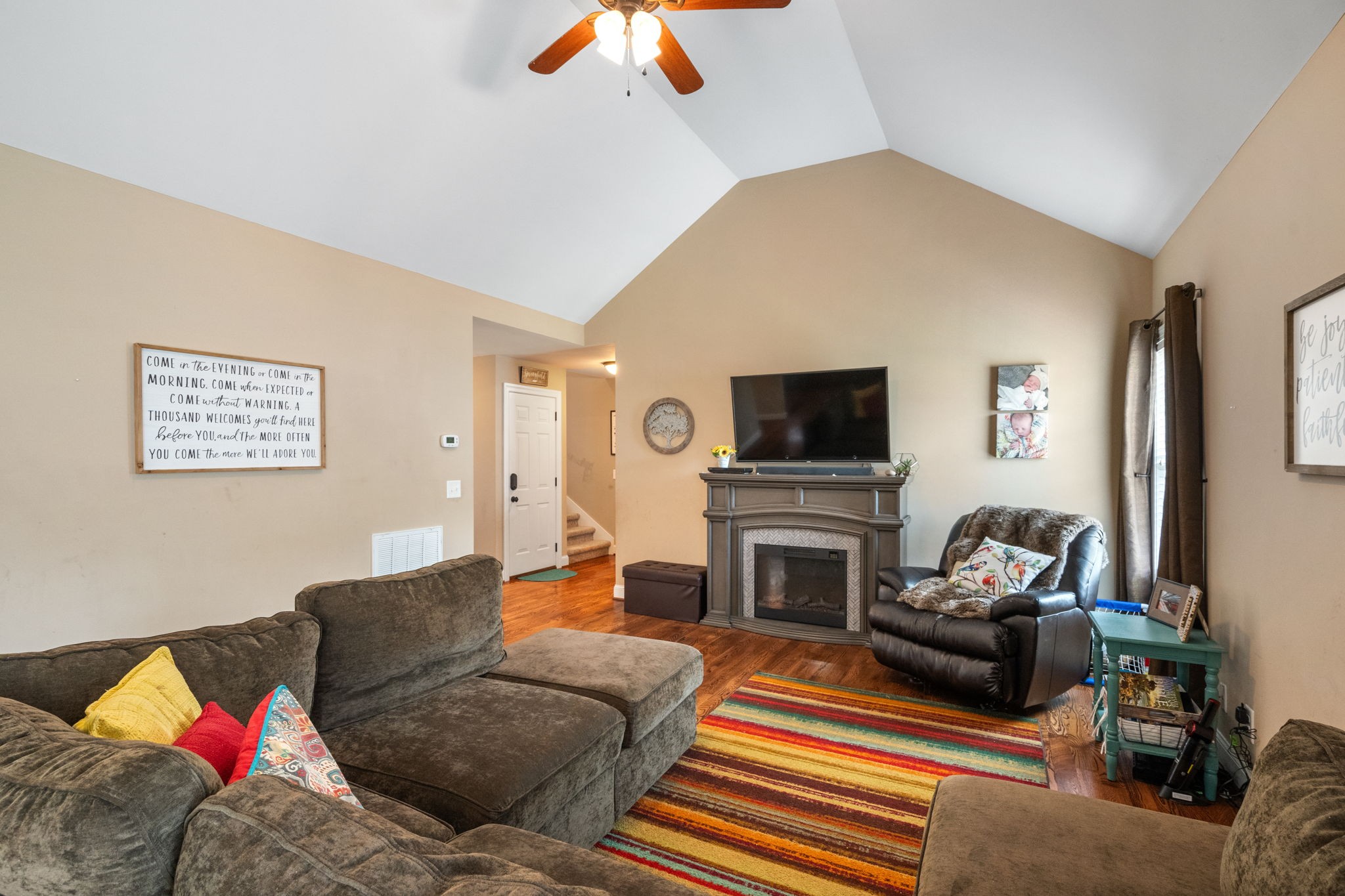 321 Brandywine Lane Springfield, TN 37172 - Photo 8 of 33 Living room picture with stairs leading to the bonus room.