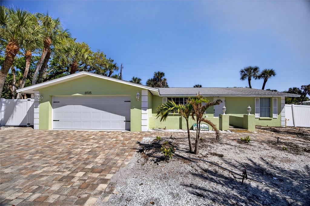 6035 Manasota Key Road Englewood, FL 34223 - Photo 2 of 54 a view of a house with a outdoor space