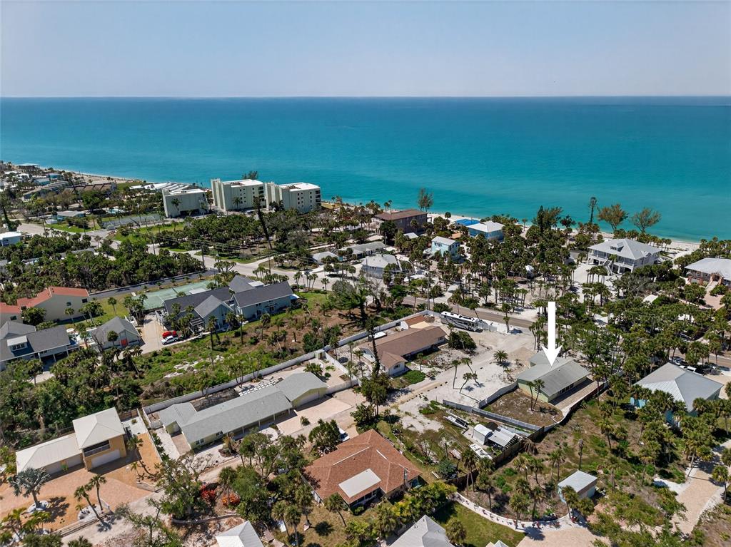 6035 Manasota Key Road Englewood, FL 34223 - Photo 37 of 54 an aerial view of a city with ocean view