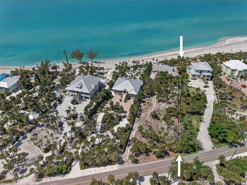 6035 Manasota Key Road Englewood, FL 34223 - Photo 40 of 54 an aerial view of a house with a yard