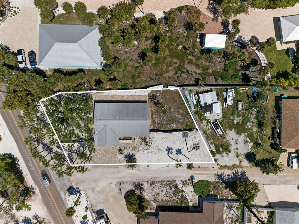 6035 Manasota Key Road Englewood, FL 34223 - Photo 50 of 54 an aerial view of house with yard