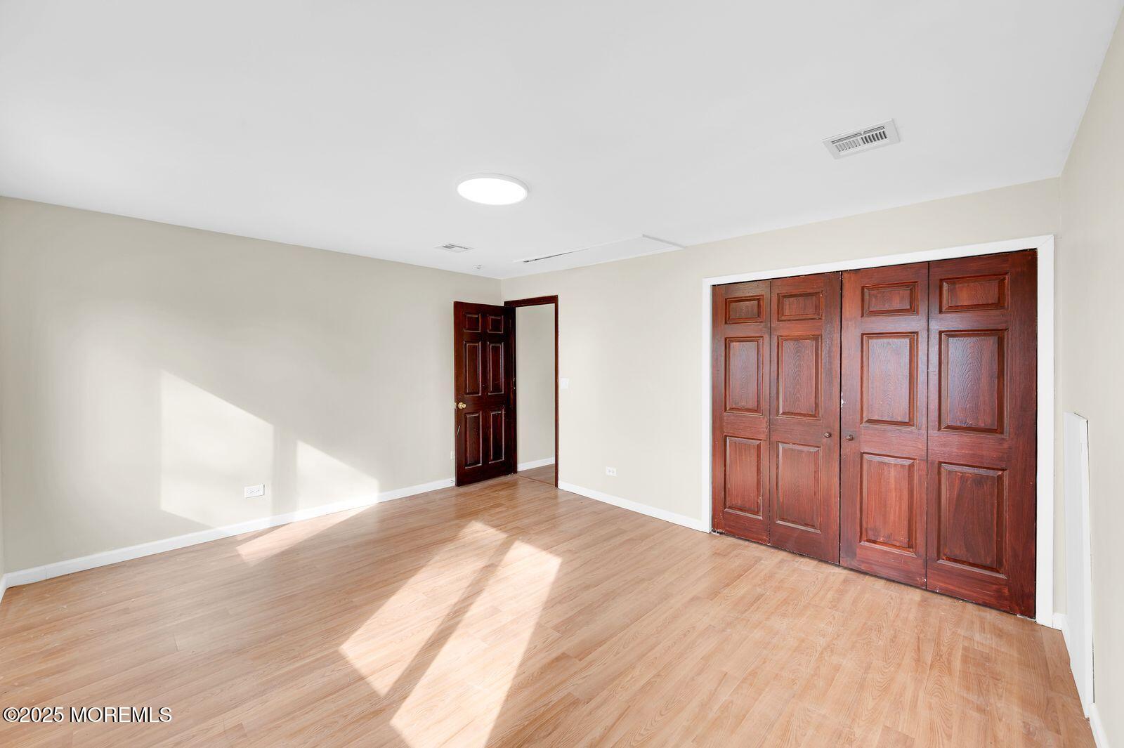 32 Lakewood Avenue Keansburg, NJ 07734 - Photo 25 of 30 a view of an empty room and window