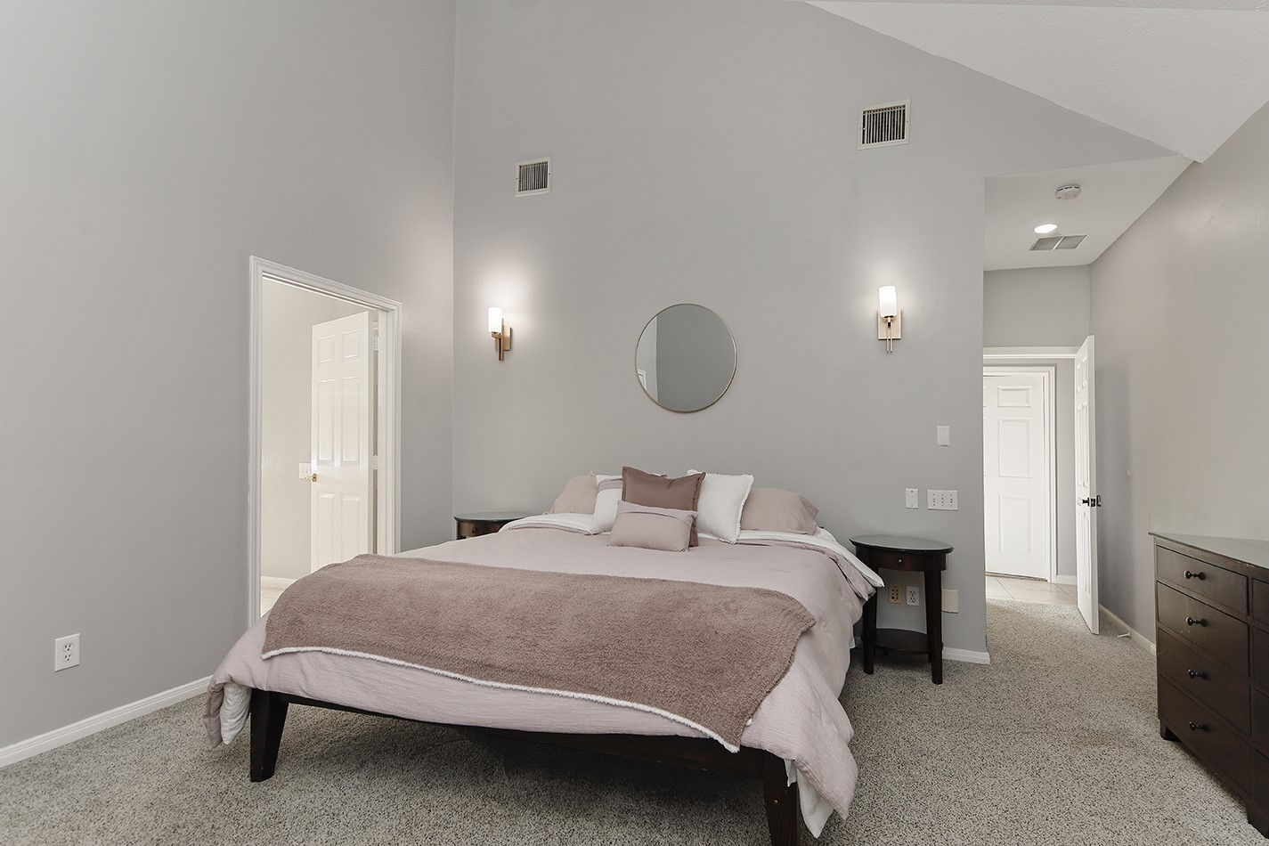 44 Lake Forest Circle Conroe, TX 77384 - Photo 21 of 49 a bedroom with a bed and a lamp