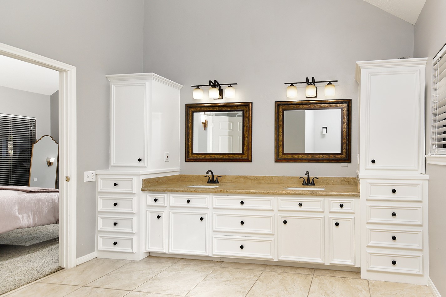 44 Lake Forest Circle Conroe, TX 77384 - Photo 24 of 49 a bathroom with a double vanity sink mirror and