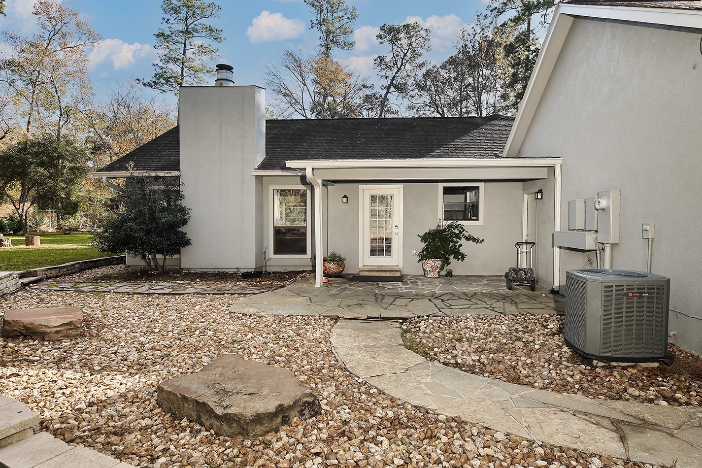 44 Lake Forest Circle Conroe, TX 77384 - Photo 40 of 49 a view of a house with backyard