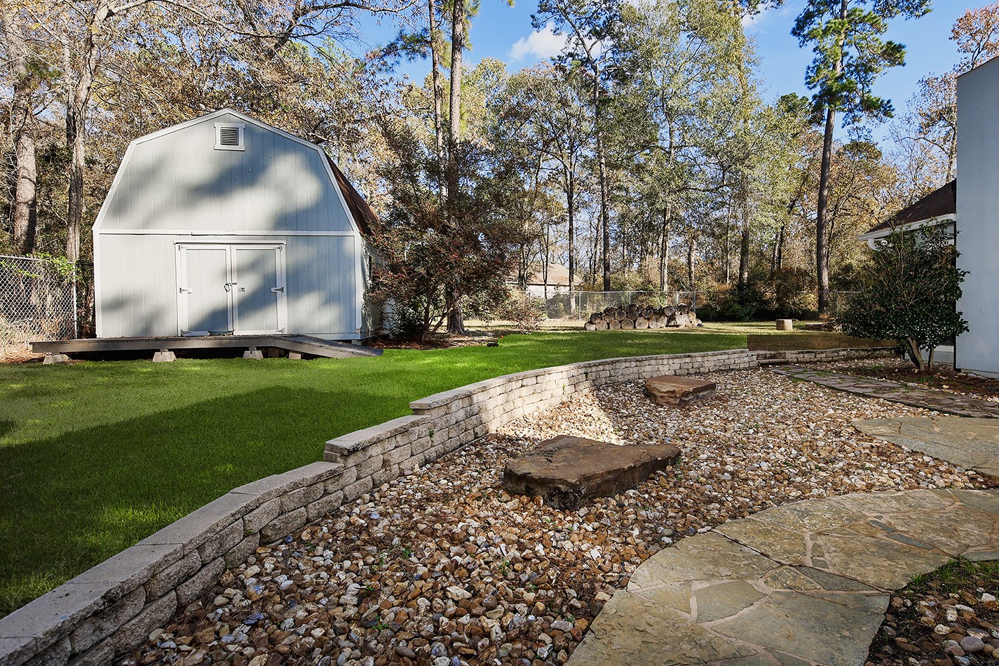 44 Lake Forest Circle Conroe, TX 77384 - Photo 41 of 49 a view of a park with large trees