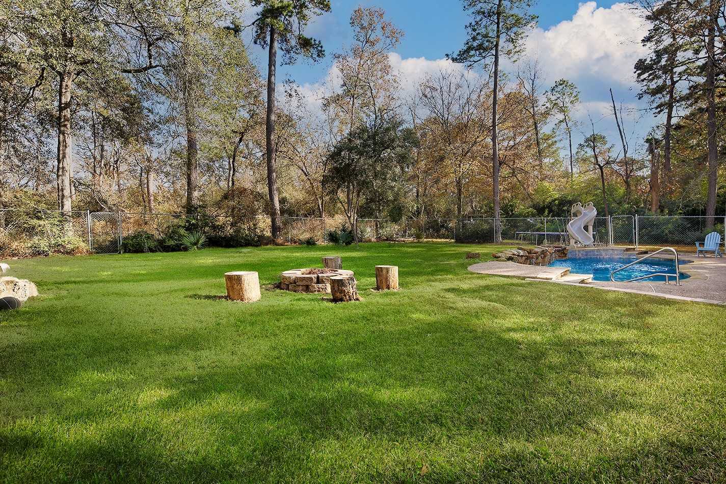 44 Lake Forest Circle Conroe, TX 77384 - Photo 42 of 49 a view of a park with large trees