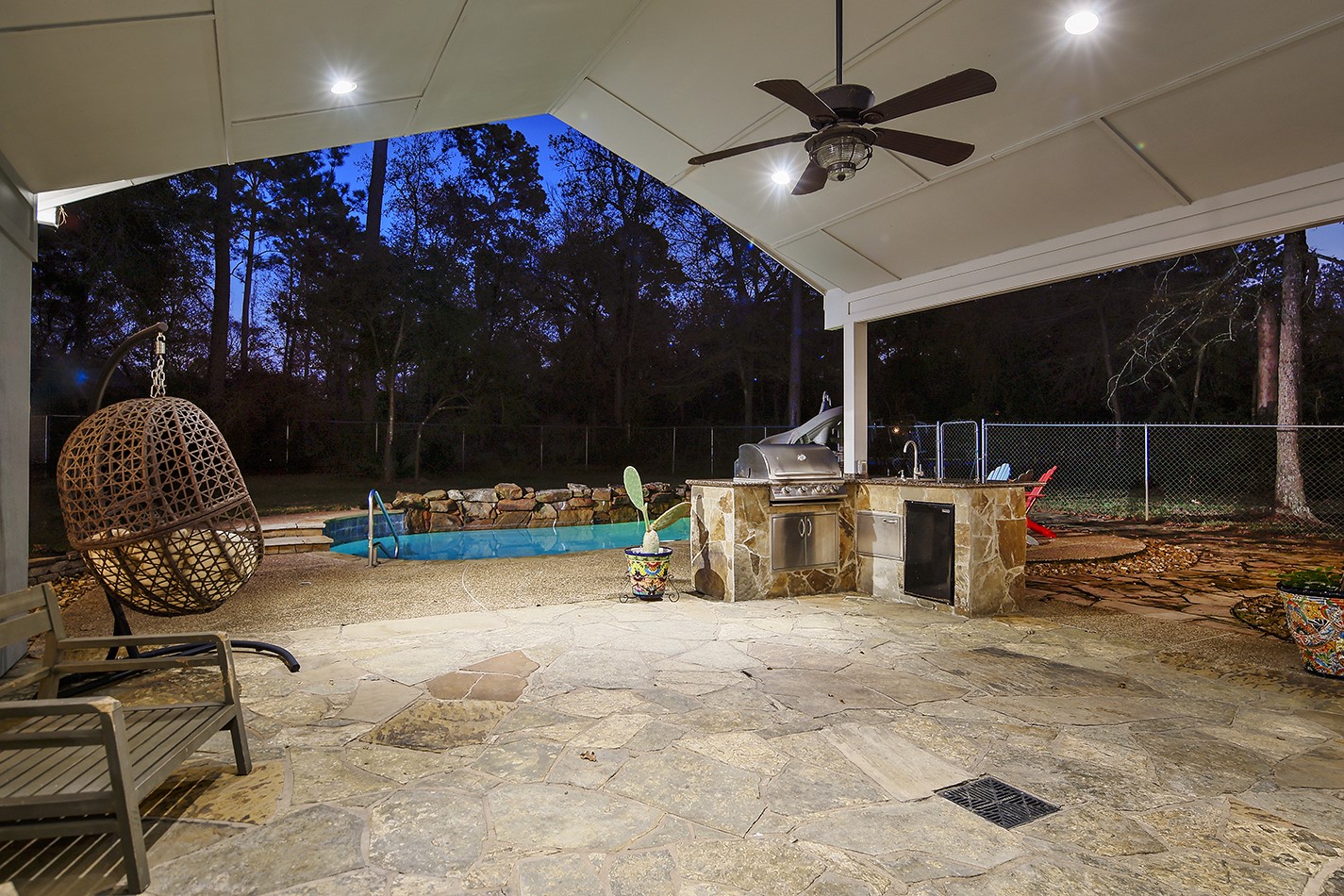 44 Lake Forest Circle Conroe, TX 77384 - Photo 48 of 49 a view of a chairs and tables in the patio