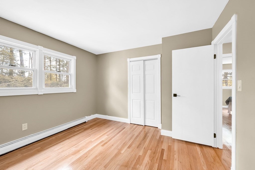 516 Old Wales Road Monson, MA 01057 - Photo 28 of 36 a view of empty room with wooden floor and fan