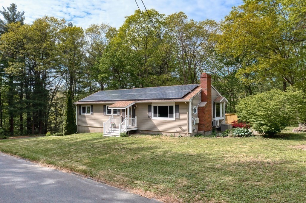 516 Old Wales Road Monson, MA 01057 - Photo 31 of 36 a front view of a house with yard