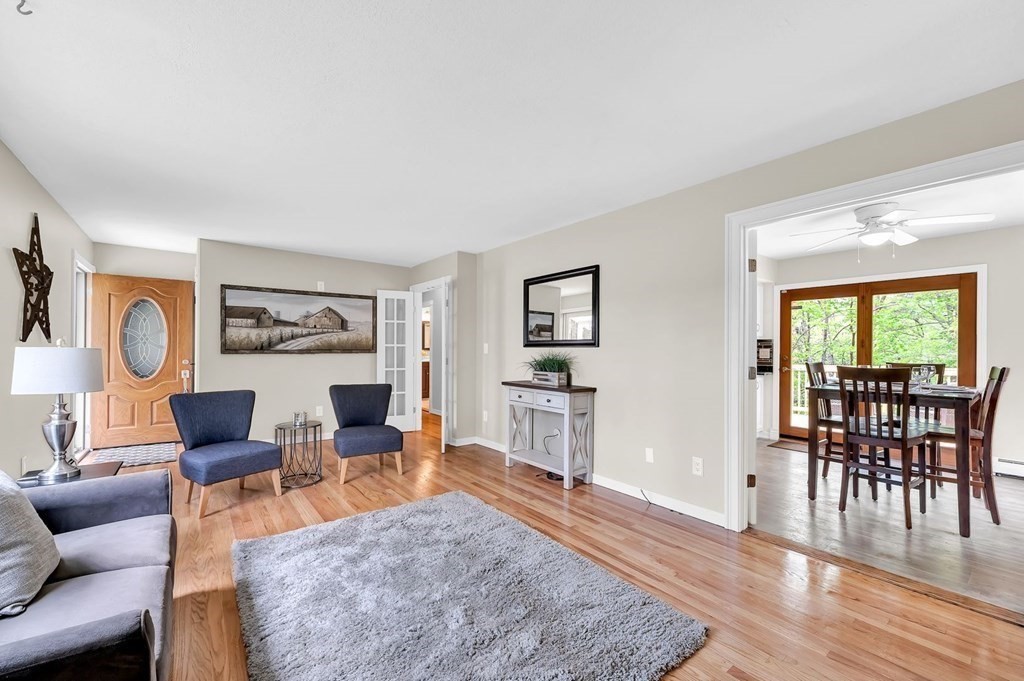 516 Old Wales Road Monson, MA 01057 - Photo 5 of 36 a living room with furniture a wooden floor and a window