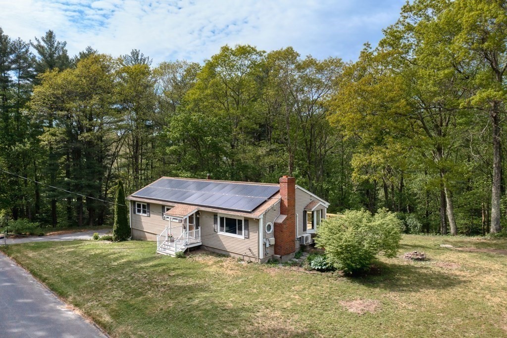 516 Old Wales Road Monson, MA 01057 - Photo 7 of 36 a view of a house with a yard