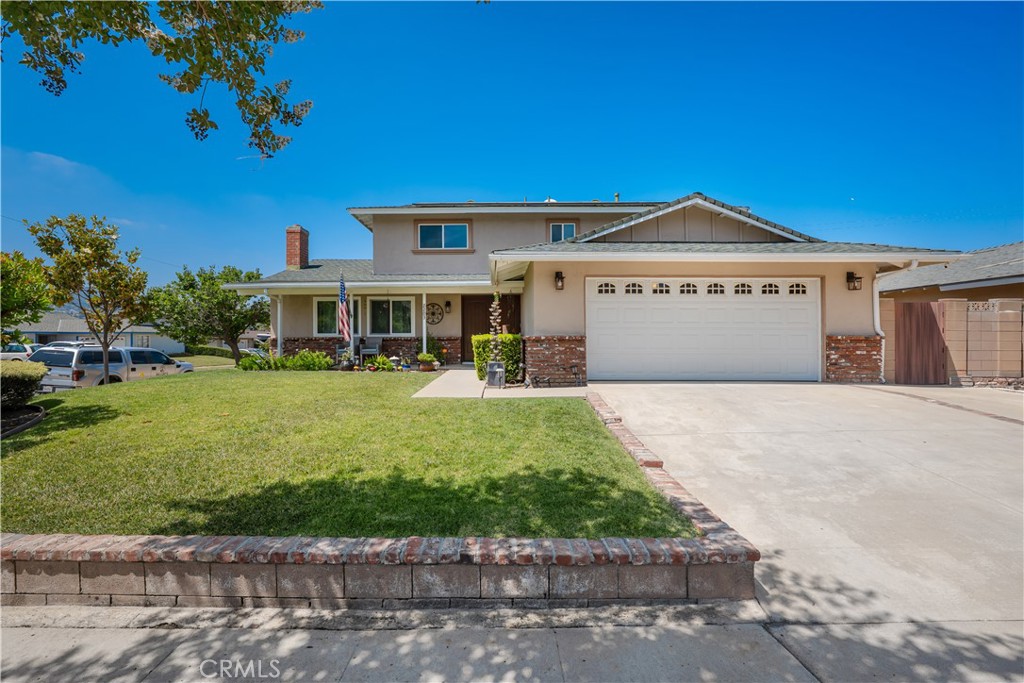 2203 Homewood Avenue Simi Valley, CA 93063 - Photo 36 of 37 a front view of a house with a yard