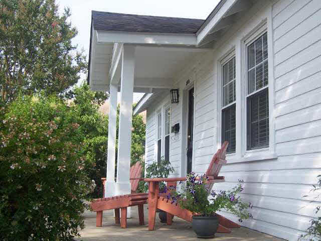 300 West Whitaker Mill Road Raleigh, NC 27608 - Photo 8 of 10 a front view of a house with a porch
