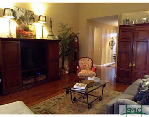 8 Helmly Court Rincon, GA 31326 - Photo 8 of 19 Living Room. High ceilings. Wood floors