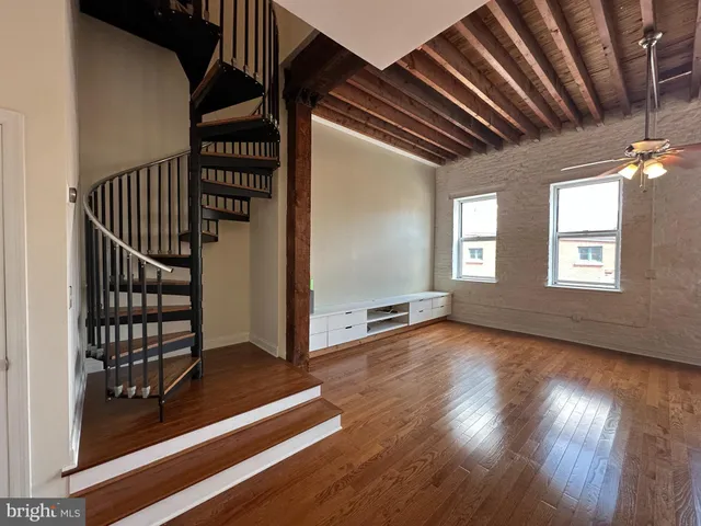 a view of entryway with wooden floor