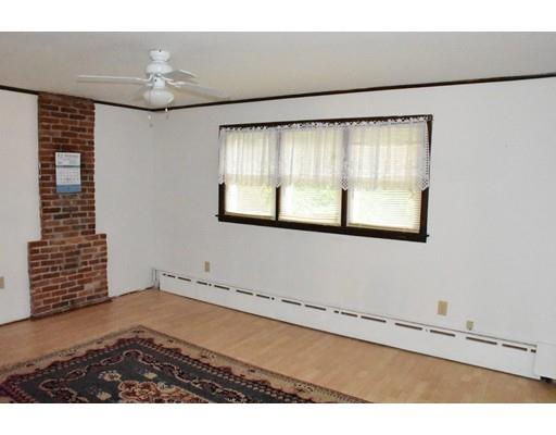 50 Mason Road Dudley, MA 01571 - Photo 12 of 26 a view of an empty room with a window