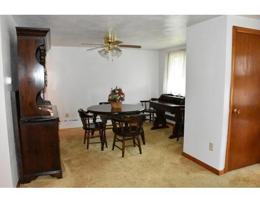 50 Mason Road Dudley, MA 01571 - Photo 4 of 26 a view of a livingroom with furniture and a window