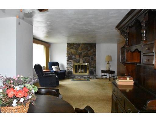 50 Mason Road Dudley, MA 01571 - Photo 5 of 26 a living room with furniture and flowers