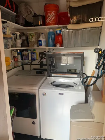 a utility room with dryer and washer
