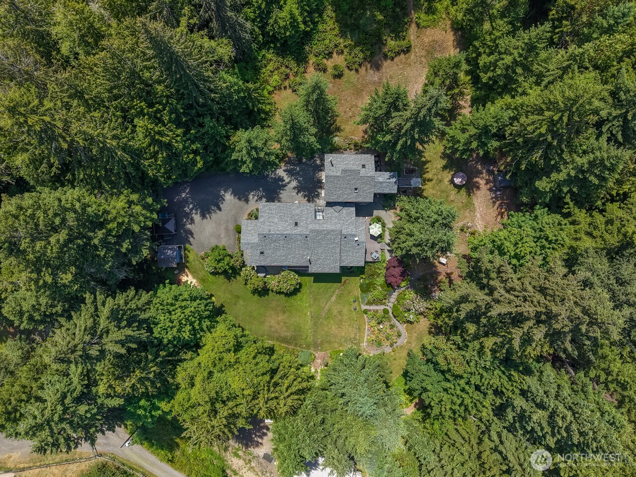 492 Walkabout Way Port Angeles, WA 98363 - Photo 12 of 40 an aerial view of a house with a yard
