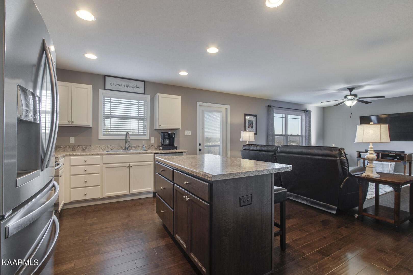 3417 Boulder Point Lane Powell, TN 37849 - Photo 12 of 31 a kitchen with granite countertop a sink stove and cabinets