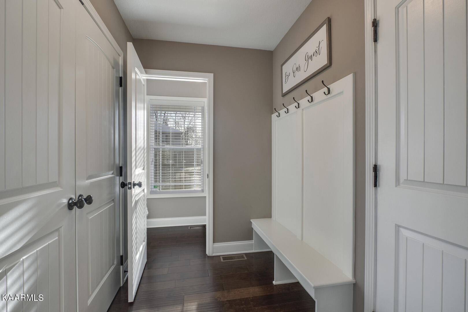 3417 Boulder Point Lane Powell, TN 37849 - Photo 14 of 31 a view of a hallway with wooden floor and staircase